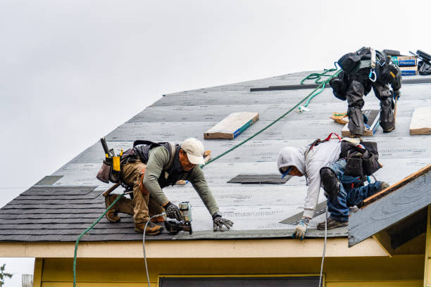 Professional Gutter Installation technician working in Melbourne, AR